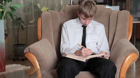 Young man prepares for study. II. Video stock 951766