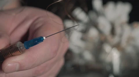 Young man preparing and using drugs. The heroin. 4K Stock Footage 44202295