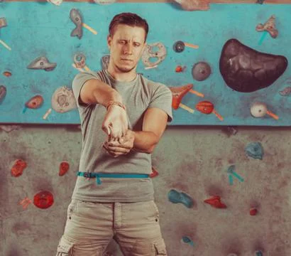 Young man preparing to climb Stock Photos