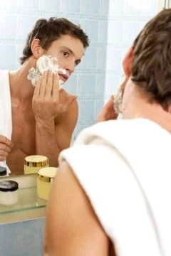 Young man preparing to shave Stock Photos