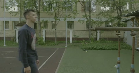 The young man pressed on the bars Stock Footage 63920082