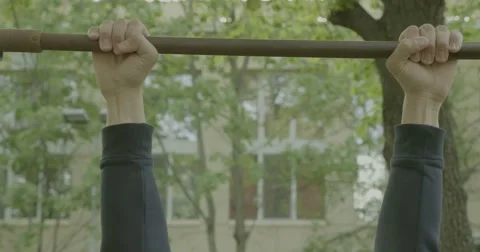 The young man pressed on the bars 库存影片 63920288