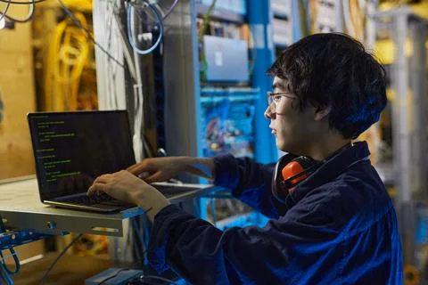Young Man Programming Server Stock Photos