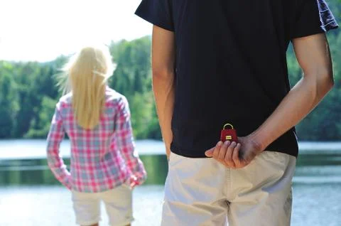 Young man proposal Photos