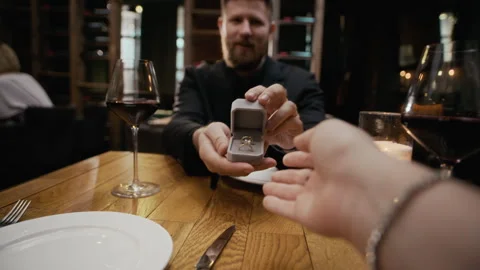 Young Man Proposing during Romantic Dinner in Luxury Restaurant Stock Footage 333397276