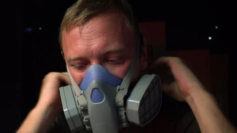Young man in protective equipment for eyes Stock Footage 282511368