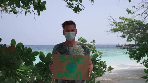 A young man in a protective mask from viruses Stock Footage 145875786
