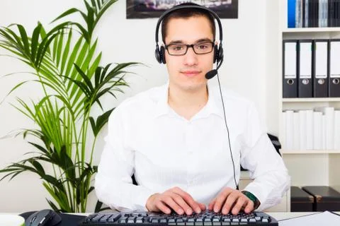 Young Man Providing It Support 写真素材