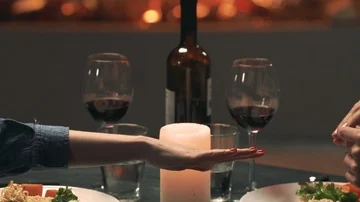 Young man puts a ring on hand of his girlfriend Stock Footage 85972708