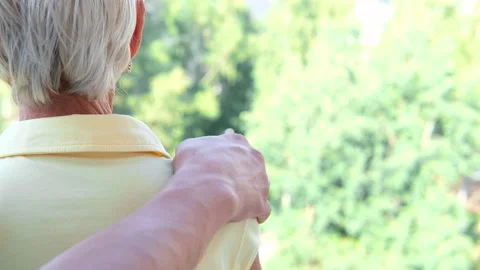 Young man putting hand on sad mother shoulder, support and care in family. son Stock Footage 157420260