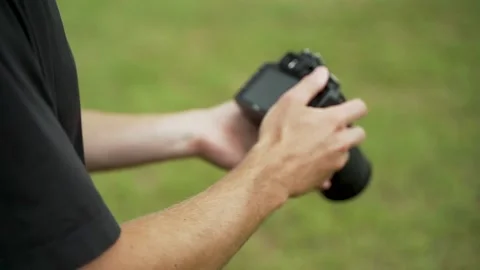 Young Man Raising Digital Camera up to His Face 스톡 동영상 136783288