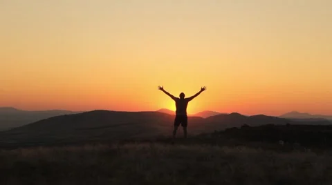 Young Man Raising Hands On a Sunset Success Conception Stock Footage 55828515