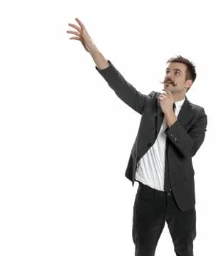 Young man reaching Stock Photos