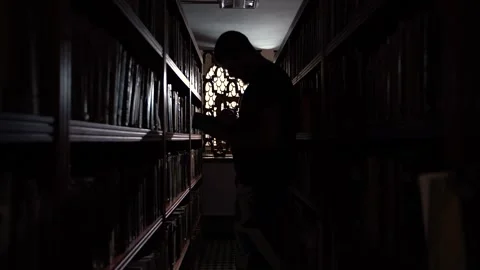 A young man reading a book inside Al qaraouiyine university Stock Footage 163266814