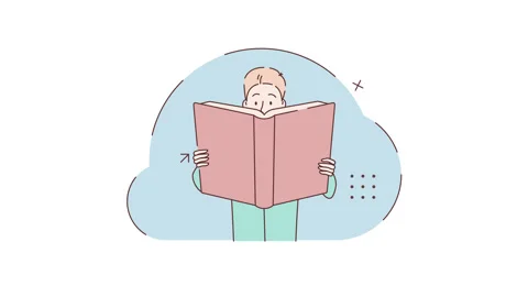 Young man reading book. Man holds a book, a student reading a textbook in hands Stock Footage 335645107