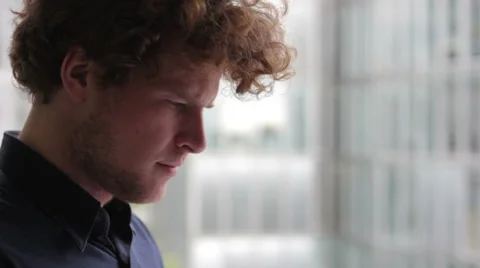 Young man reading document Stock Footage 41631215