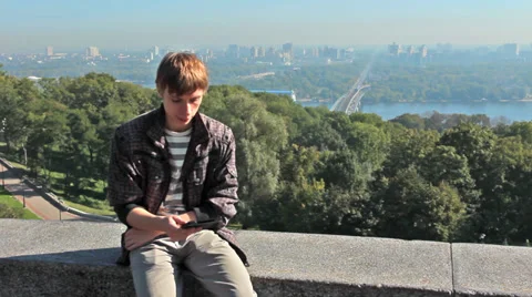 Young Man Reading On Electronic Book At Kiev Vídeo Stock 39145058