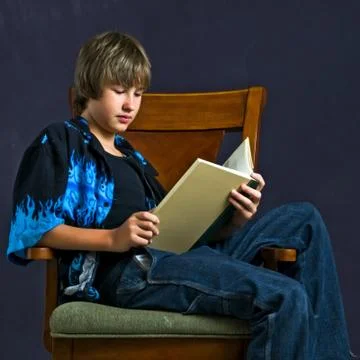 Young Man Reading Stock Photos