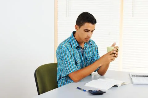 Young man reading Stock Photos