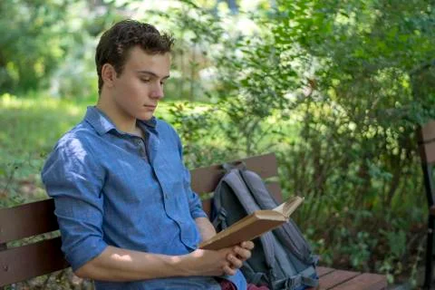 Young man reading Stock Photos