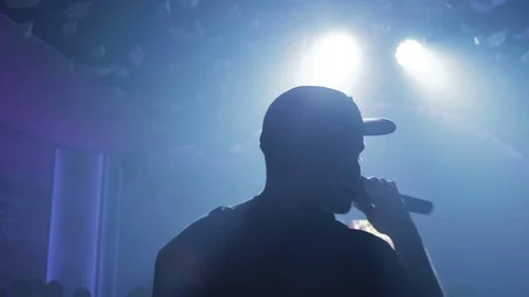 A young man is reading rap on the stage Stock Footage 73537639