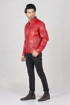Young man in red jacket full height length Stock Photos
