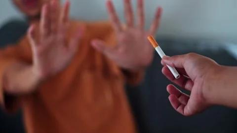 Young man refusing offered cigarette for stop smoking concept Video stock 316884844