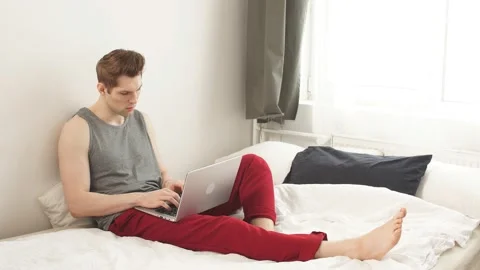 Young man on remote work Stock Footage 127035368