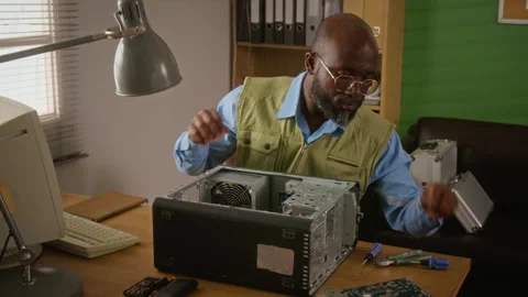 Young Man Repairing Desktop Computer in Workshop Stock Footage 341425305
