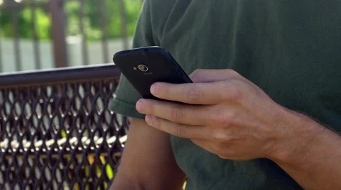 Young man replies to text message on phone, CLOSE, 4K Stock Footage 48703105