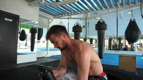 Young man resting after a hard workout Stock Footage 140124463