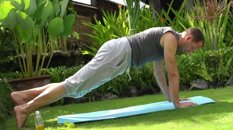 Young man resting after workout in the gardenHD Stock Footage 39966530