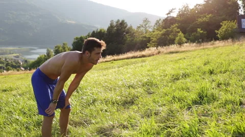 Young man resting during trial running workout Stock Footage 55865768