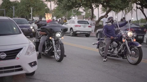 Young Man Rides Through Miami Traffic.  Driving On Miami Streets, Roads. Stock Footage 110573568