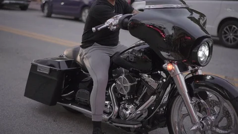 Young Man Rides Through Miami Traffic.  Driving On Miami Streets, Roads. Stock Footage 110573642