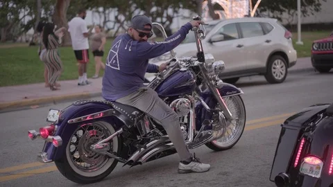 Young Man Rides Through Miami Traffic.  Driving On Miami Streets, Roads. Video stock 110573692