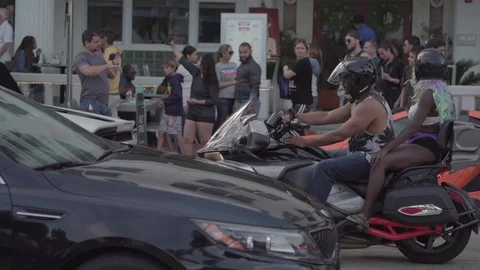 Young Man Rides Through Miami Traffic. Driving On Miami Streets, Roads. 스톡 동영상 110574424