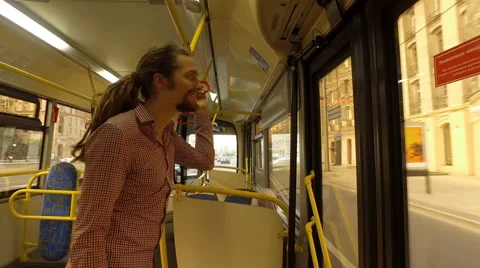 A young man is riding a bus Stock Footage 65288314