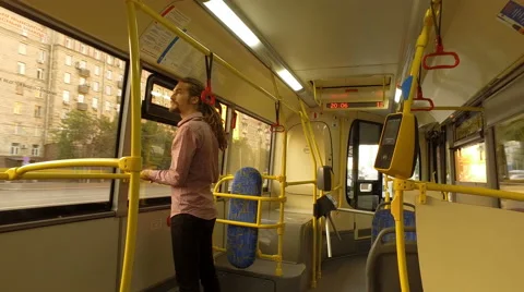 A young man riding a bus Stock Footage 65289160