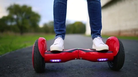 Young man riding on the Hoverboard in the park. content technologies. a new Stockbeeldmateriaal 81086507