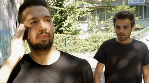 Young Man Robs Another Man With A Gun, Dangerous, Stealing, Front Shot Stock Footage 41544340