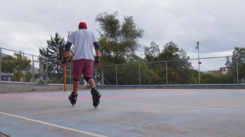 A young man roller skating in the latin park  Video stock 246511254