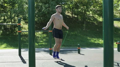 A young man rope jumping very fast Stock Footage 67626764