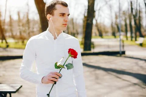 Young man with rose Stock Photos