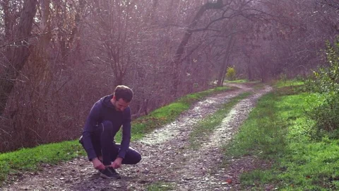 Young man runner training Stock Footage 84992713