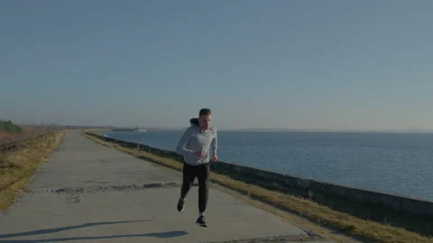 Young Man Is Running and Doing Somersaults Stock Footage 165823368