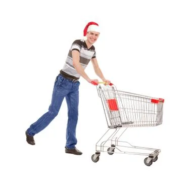 Young Man Running with Empty Shopping Cart Stock Photos