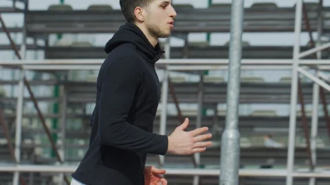 Young man running Video stock 100029899