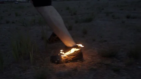 Young man running on sand in burning sneaker at coast Slow motion Stock Footage 95909298