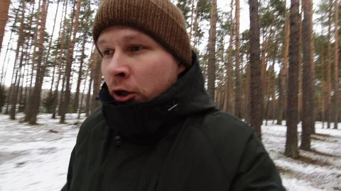 A young man running through the woods from pursuers. Fear, loss, lost, chase. Stock Footage 123541819